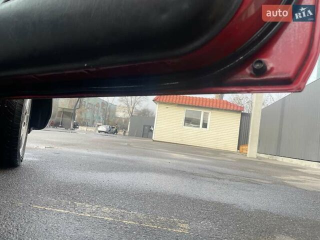 Красный Тойота Королла, объемом двигателя 1.3 л и пробегом 430 тыс. км за 1900 $, фото 11 на Automoto.ua