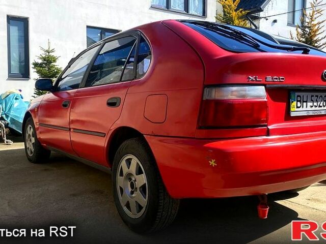 Красный Тойота Королла, объемом двигателя 1.3 л и пробегом 264 тыс. км за 2500 $, фото 1 на Automoto.ua