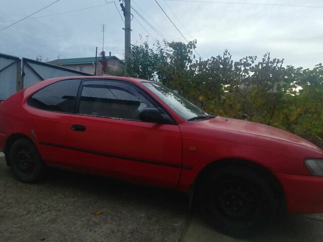 Червоний Тойота Королла, об'ємом двигуна 1.3 л та пробігом 289 тис. км за 2100 $, фото 1 на Automoto.ua