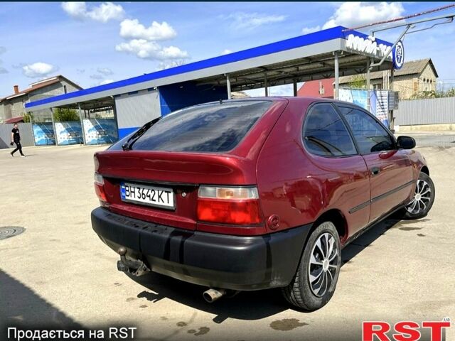 Червоний Тойота Королла, об'ємом двигуна 1.3 л та пробігом 340 тис. км за 2500 $, фото 2 на Automoto.ua