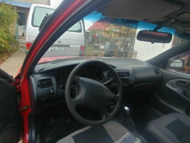 Червоний Тойота Королла, об'ємом двигуна 1.3 л та пробігом 289 тис. км за 2100 $, фото 9 на Automoto.ua