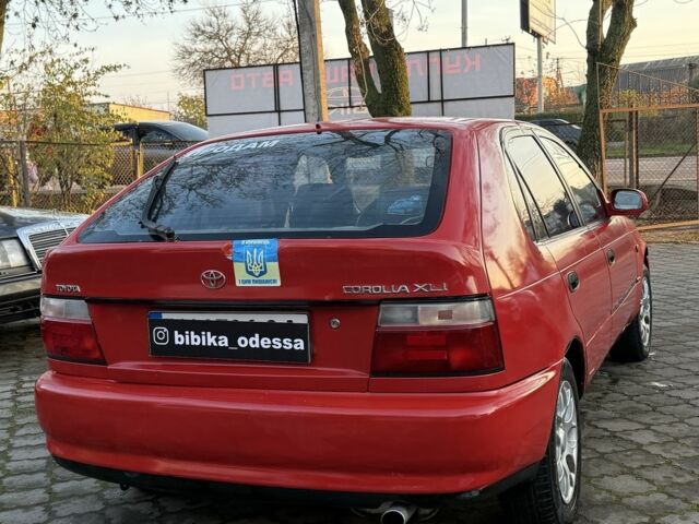 Красный Тойота Королла, объемом двигателя 1.6 л и пробегом 290 тыс. км за 1300 $, фото 6 на Automoto.ua