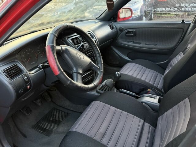 Красный Тойота Королла, объемом двигателя 1.6 л и пробегом 290 тыс. км за 1300 $, фото 8 на Automoto.ua