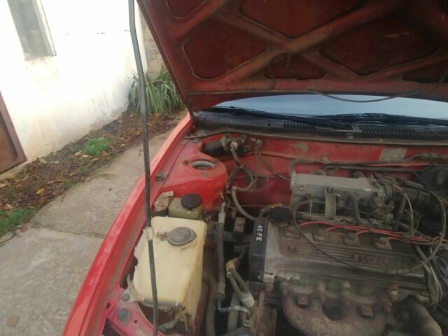 Червоний Тойота Королла, об'ємом двигуна 1.3 л та пробігом 289 тис. км за 2100 $, фото 5 на Automoto.ua