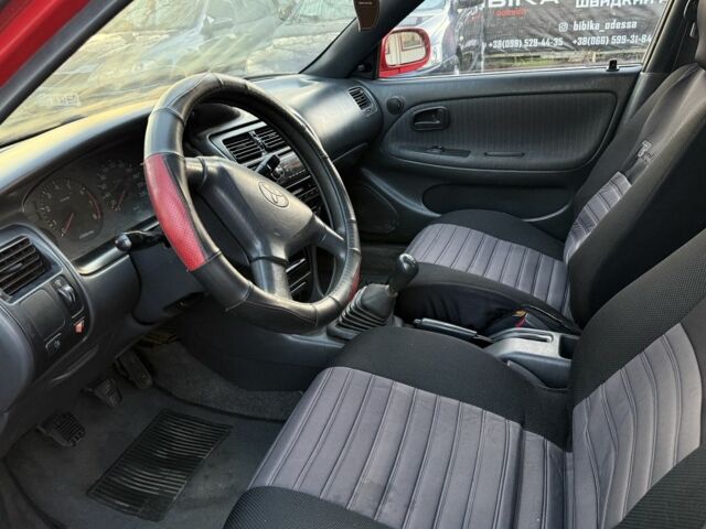 Красный Тойота Королла, объемом двигателя 1.6 л и пробегом 290 тыс. км за 1300 $, фото 10 на Automoto.ua