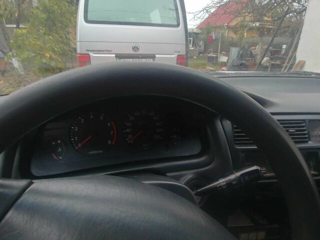 Червоний Тойота Королла, об'ємом двигуна 1.3 л та пробігом 289 тис. км за 2100 $, фото 10 на Automoto.ua