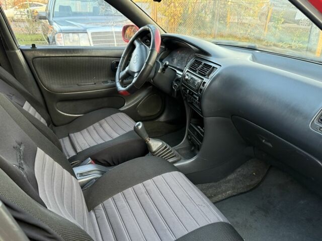 Красный Тойота Королла, объемом двигателя 1.6 л и пробегом 290 тыс. км за 1300 $, фото 9 на Automoto.ua