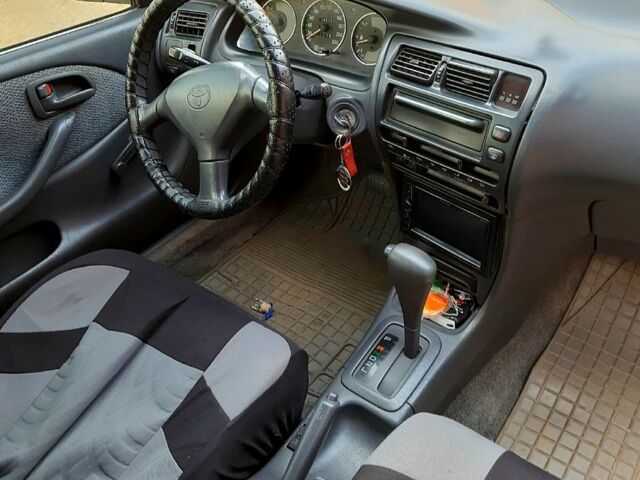 Червоний Тойота Королла, об'ємом двигуна 1.3 л та пробігом 340 тис. км за 2500 $, фото 3 на Automoto.ua