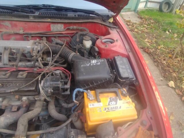 Червоний Тойота Королла, об'ємом двигуна 1.3 л та пробігом 289 тис. км за 2100 $, фото 2 на Automoto.ua