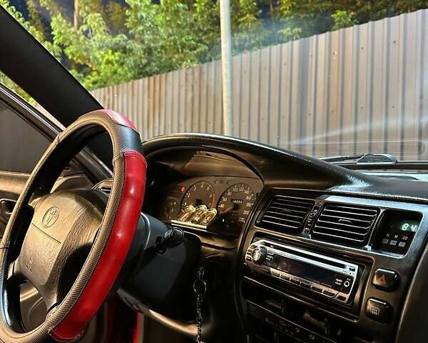 Красный Тойота Королла, объемом двигателя 1.3 л и пробегом 270 тыс. км за 3000 $, фото 6 на Automoto.ua