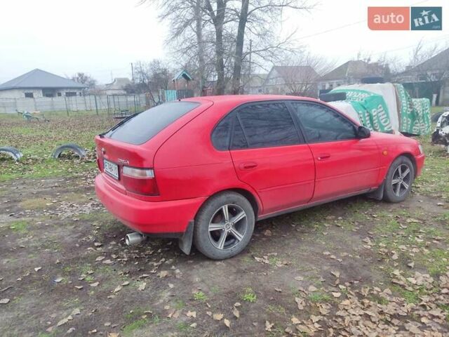 Красный Тойота Королла, объемом двигателя 1.3 л и пробегом 270 тыс. км за 3000 $, фото 2 на Automoto.ua