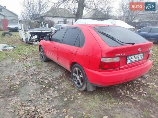 Красный Тойота Королла, объемом двигателя 1.3 л и пробегом 270 тыс. км за 3000 $, фото 4 на Automoto.ua