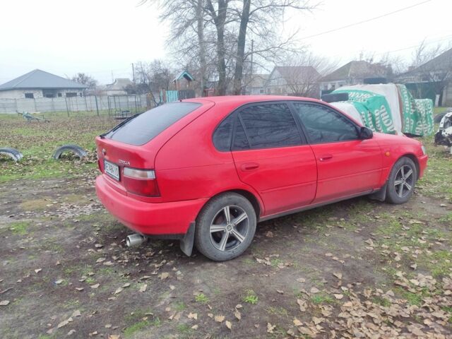 Красный Тойота Королла, объемом двигателя 1.3 л и пробегом 300 тыс. км за 3000 $, фото 2 на Automoto.ua