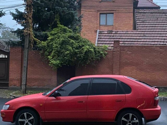 Красный Тойота Королла, объемом двигателя 1.3 л и пробегом 300 тыс. км за 3000 $, фото 7 на Automoto.ua