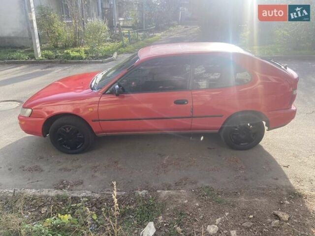 Красный Тойота Королла, объемом двигателя 1.3 л и пробегом 300 тыс. км за 2850 $, фото 2 на Automoto.ua