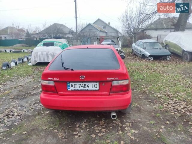 Красный Тойота Королла, объемом двигателя 1.3 л и пробегом 270 тыс. км за 3000 $, фото 3 на Automoto.ua