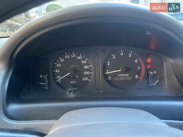 Красный Тойота Королла, объемом двигателя 1.33 л и пробегом 412 тыс. км за 2500 $, фото 7 на Automoto.ua