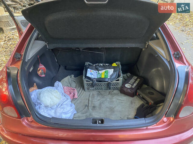 Красный Тойота Королла, объемом двигателя 1.33 л и пробегом 412 тыс. км за 2500 $, фото 12 на Automoto.ua