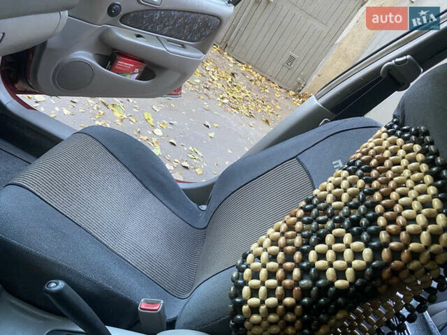 Красный Тойота Королла, объемом двигателя 1.33 л и пробегом 412 тыс. км за 2500 $, фото 9 на Automoto.ua