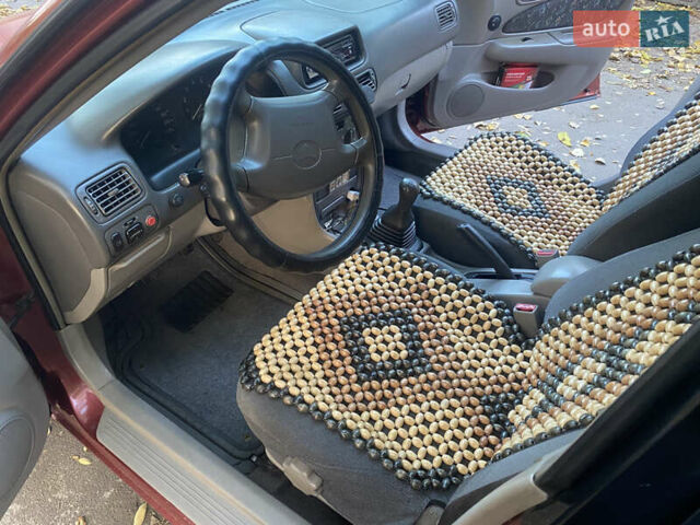 Красный Тойота Королла, объемом двигателя 1.33 л и пробегом 412 тыс. км за 2500 $, фото 6 на Automoto.ua