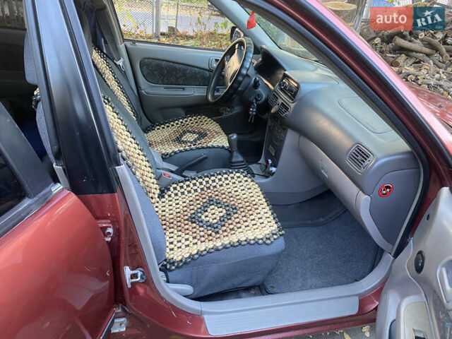 Красный Тойота Королла, объемом двигателя 1.33 л и пробегом 412 тыс. км за 2500 $, фото 4 на Automoto.ua