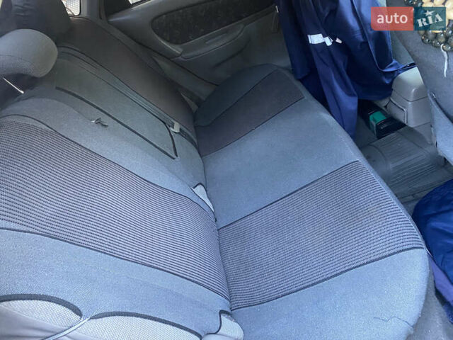 Красный Тойота Королла, объемом двигателя 1.33 л и пробегом 412 тыс. км за 2500 $, фото 5 на Automoto.ua