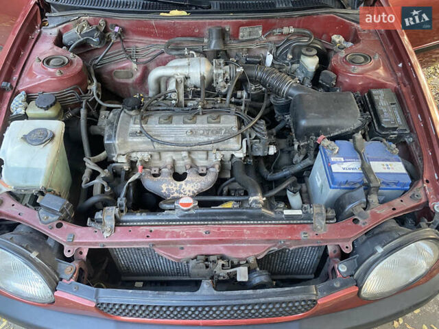 Красный Тойота Королла, объемом двигателя 1.33 л и пробегом 412 тыс. км за 2500 $, фото 11 на Automoto.ua