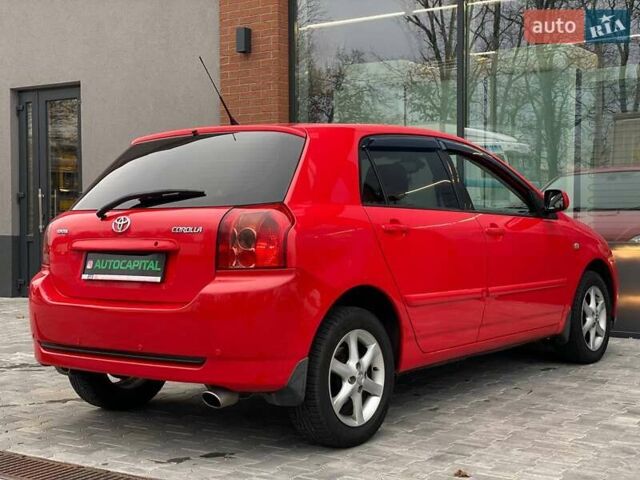 Червоний Тойота Королла, об'ємом двигуна 1.6 л та пробігом 302 тис. км за 6490 $, фото 11 на Automoto.ua