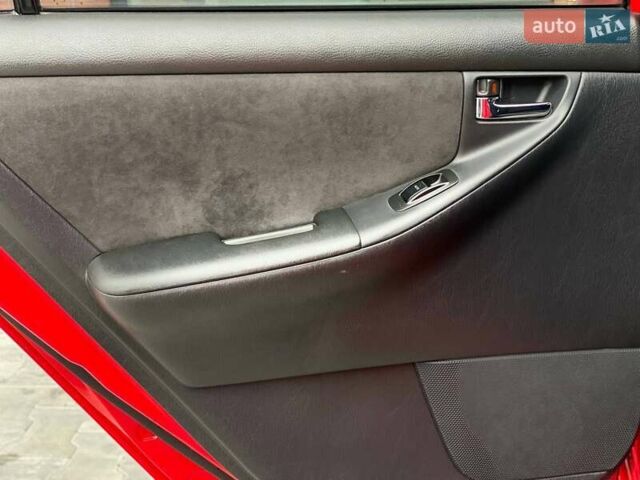 Червоний Тойота Королла, об'ємом двигуна 1.6 л та пробігом 302 тис. км за 6490 $, фото 41 на Automoto.ua