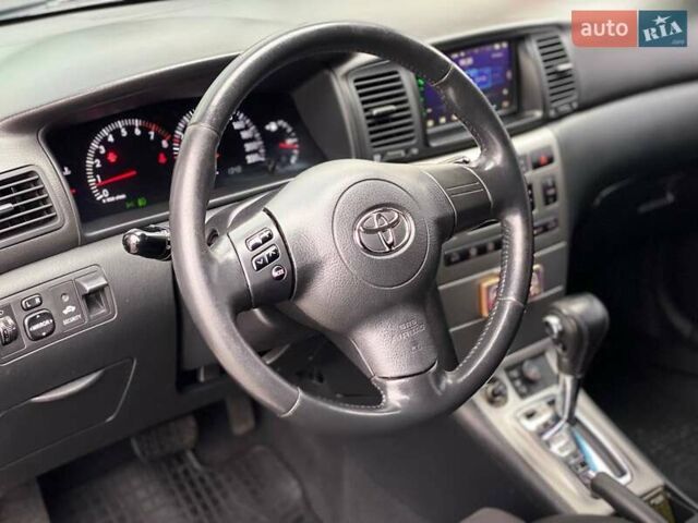 Червоний Тойота Королла, об'ємом двигуна 1.6 л та пробігом 302 тис. км за 6490 $, фото 27 на Automoto.ua