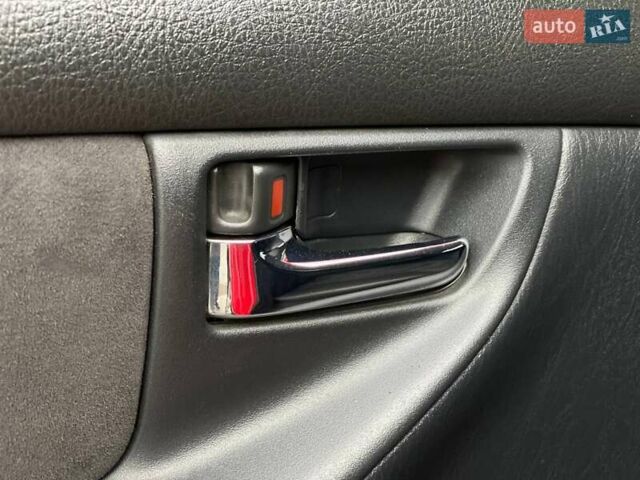 Червоний Тойота Королла, об'ємом двигуна 1.6 л та пробігом 302 тис. км за 6490 $, фото 42 на Automoto.ua