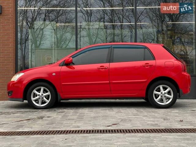 Червоний Тойота Королла, об'ємом двигуна 1.6 л та пробігом 302 тис. км за 6490 $, фото 6 на Automoto.ua