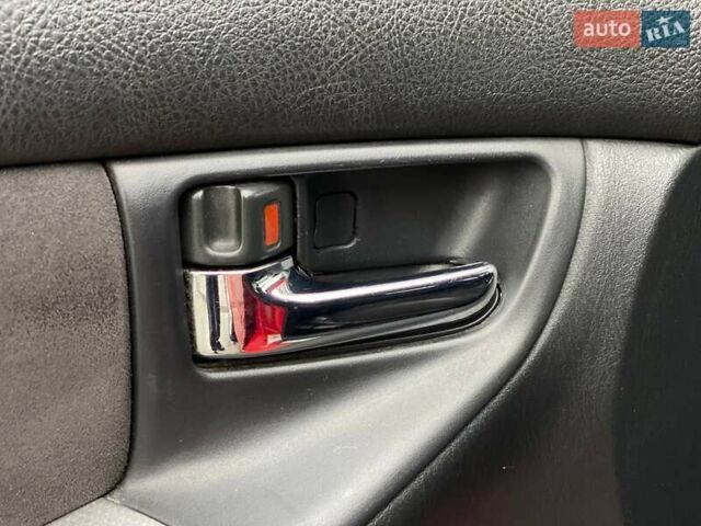 Червоний Тойота Королла, об'ємом двигуна 1.6 л та пробігом 302 тис. км за 6490 $, фото 20 на Automoto.ua