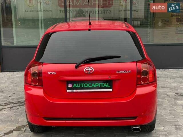 Червоний Тойота Королла, об'ємом двигуна 1.6 л та пробігом 302 тис. км за 6490 $, фото 10 на Automoto.ua