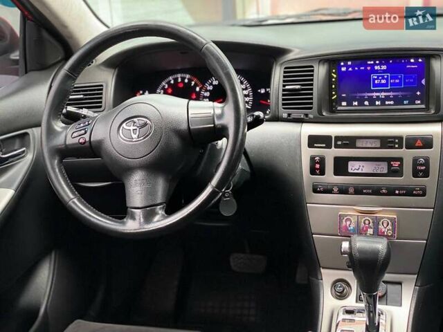 Червоний Тойота Королла, об'ємом двигуна 1.6 л та пробігом 302 тис. км за 6490 $, фото 44 на Automoto.ua