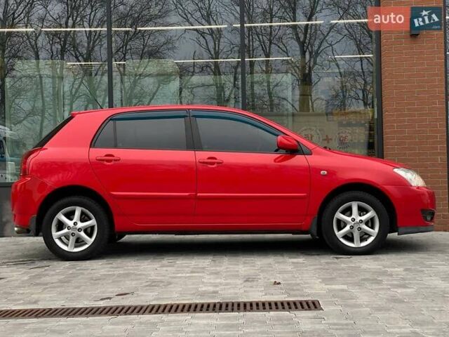 Червоний Тойота Королла, об'ємом двигуна 1.6 л та пробігом 302 тис. км за 6490 $, фото 7 на Automoto.ua