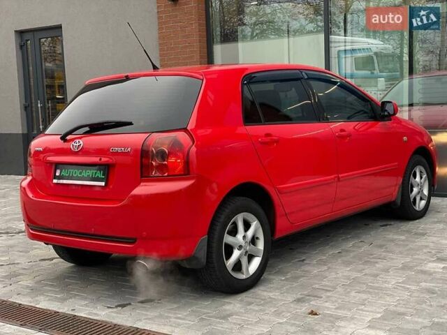 Червоний Тойота Королла, об'ємом двигуна 1.6 л та пробігом 302 тис. км за 6490 $, фото 19 на Automoto.ua
