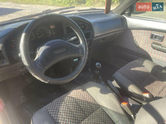 Червоний Тойота Королла, об'ємом двигуна 1.3 л та пробігом 187 тис. км за 2350 $, фото 15 на Automoto.ua