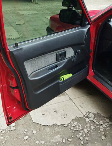 Красный Тойота Королла, объемом двигателя 1.32 л и пробегом 345 тыс. км за 1800 $, фото 5 на Automoto.ua