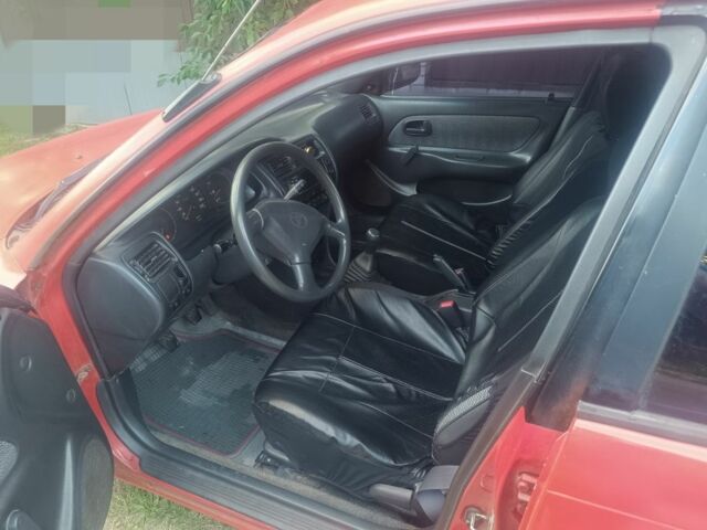 Красный Тойота Королла, объемом двигателя 2 л и пробегом 500 тыс. км за 1800 $, фото 3 на Automoto.ua