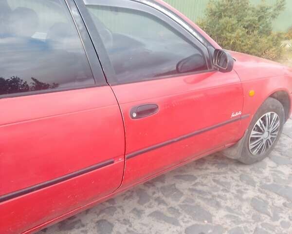 Красный Тойота Королла, объемом двигателя 1.3 л и пробегом 396 тыс. км за 2500 $, фото 2 на Automoto.ua