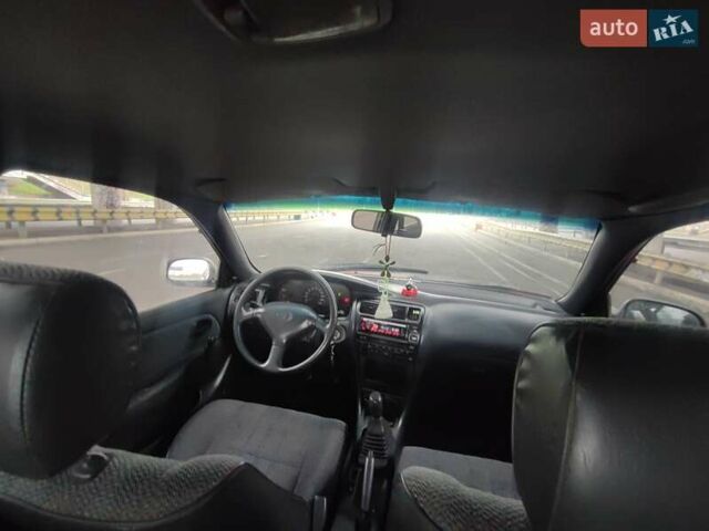 Красный Тойота Королла, объемом двигателя 1.4 л и пробегом 422 тыс. км за 2200 $, фото 7 на Automoto.ua