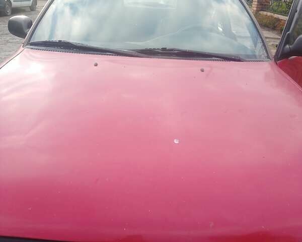 Красный Тойота Королла, объемом двигателя 1.3 л и пробегом 396 тыс. км за 2500 $, фото 1 на Automoto.ua