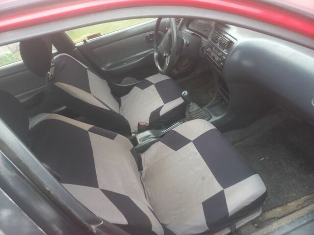 Красный Тойота Королла, объемом двигателя 1.3 л и пробегом 496 тыс. км за 1600 $, фото 2 на Automoto.ua