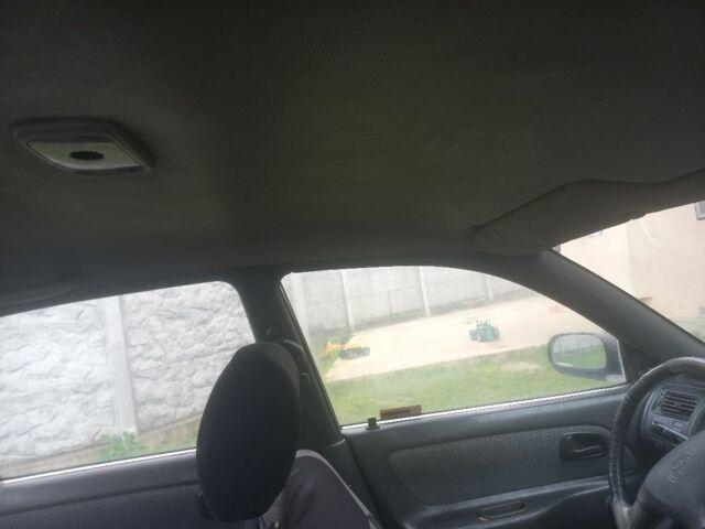 Красный Тойота Королла, объемом двигателя 1.3 л и пробегом 496 тыс. км за 1600 $, фото 5 на Automoto.ua