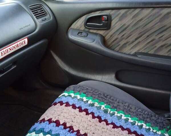 Червоний Тойота Королла, об'ємом двигуна 1.33 л та пробігом 335 тис. км за 2000 $, фото 3 на Automoto.ua