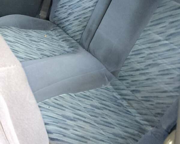 Червоний Тойота Королла, об'ємом двигуна 1.33 л та пробігом 335 тис. км за 2000 $, фото 4 на Automoto.ua