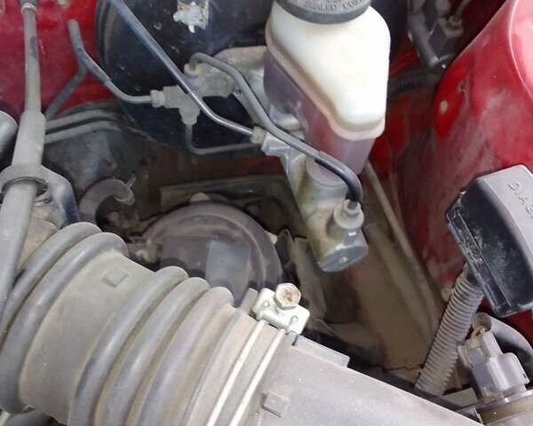 Червоний Тойота Королла, об'ємом двигуна 1.33 л та пробігом 335 тис. км за 2000 $, фото 11 на Automoto.ua