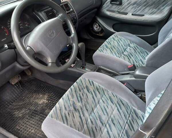Червоний Тойота Королла, об'ємом двигуна 1.6 л та пробігом 245 тис. км за 2200 $, фото 8 на Automoto.ua