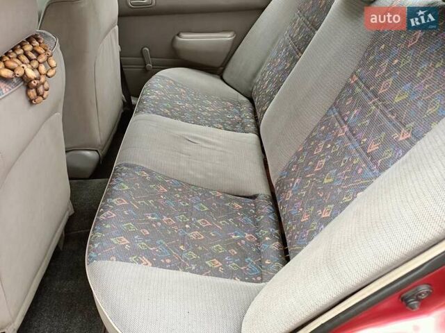 Червоний Тойота Королла, об'ємом двигуна 1.4 л та пробігом 270 тис. км за 1300 $, фото 27 на Automoto.ua